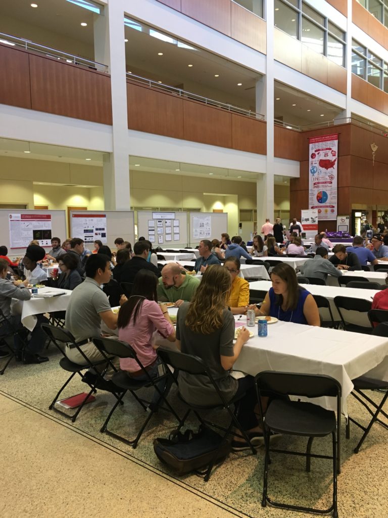 Attendees eating lunch together